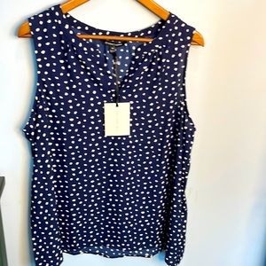 Brand new navy/ivory sleeveless blouse. Size XXL NWT